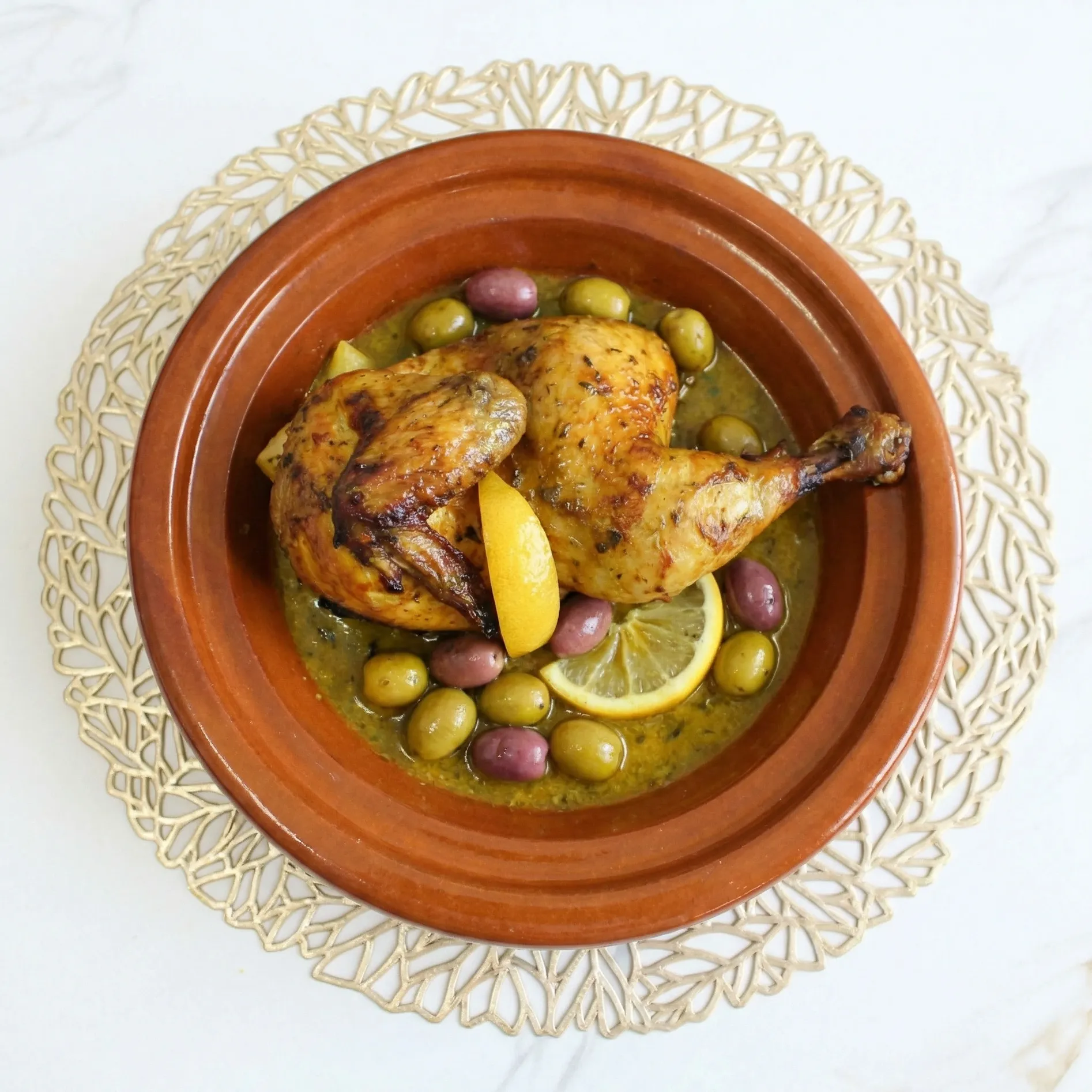 Chicken Tajine with Olives at Tajine House Restaurant Edmonton - half chicken with Moroccan spices and preserved lemon